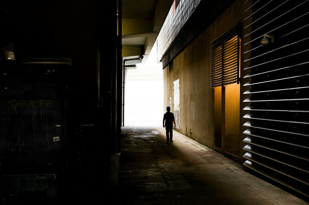 detective in dark alley