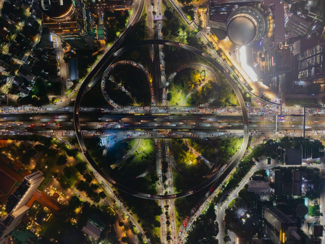 drone flying over city at night